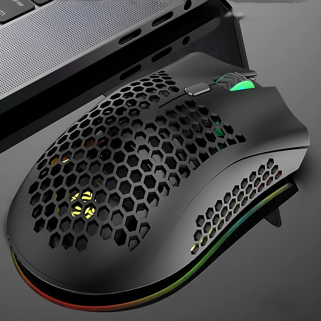Wireless gaming mouse with hollow-out illuminated design in cyan colour showing ergonomic shape