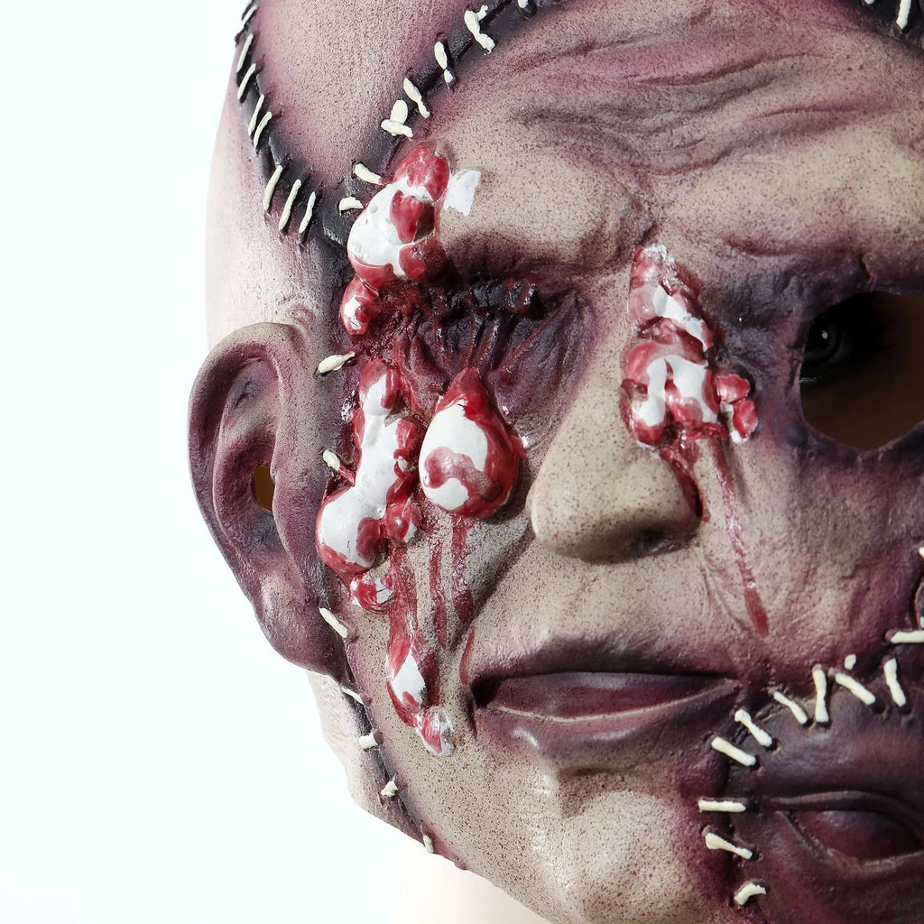 Halloween three-sided grimace horror mask in natural latex showing realistic facial effect