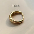 Women's minimalist geometric water drop earrings in gold or silver finish
