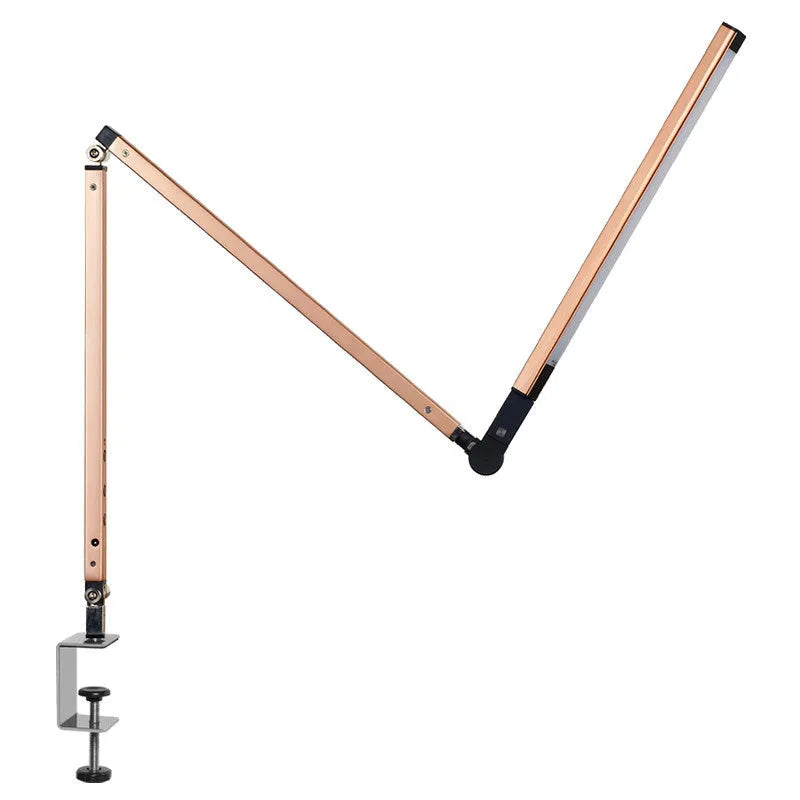 Adjustable aluminium desk lamp with clip base and remote control, shown in dazzling black finish.
