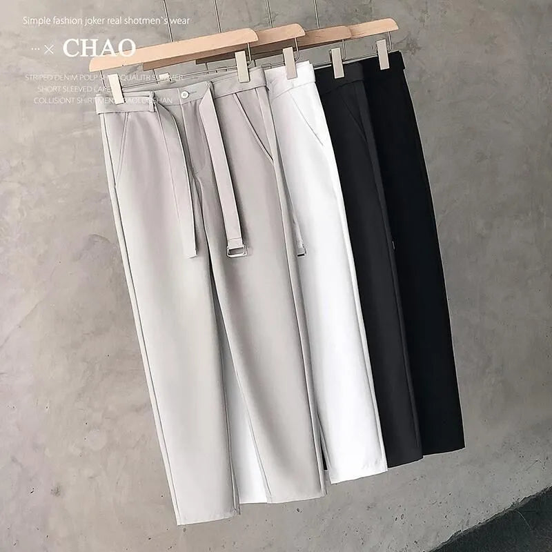 Boys slim straight tapered trousers in wool blend fabric, shown in black, white, dark grey and light grey