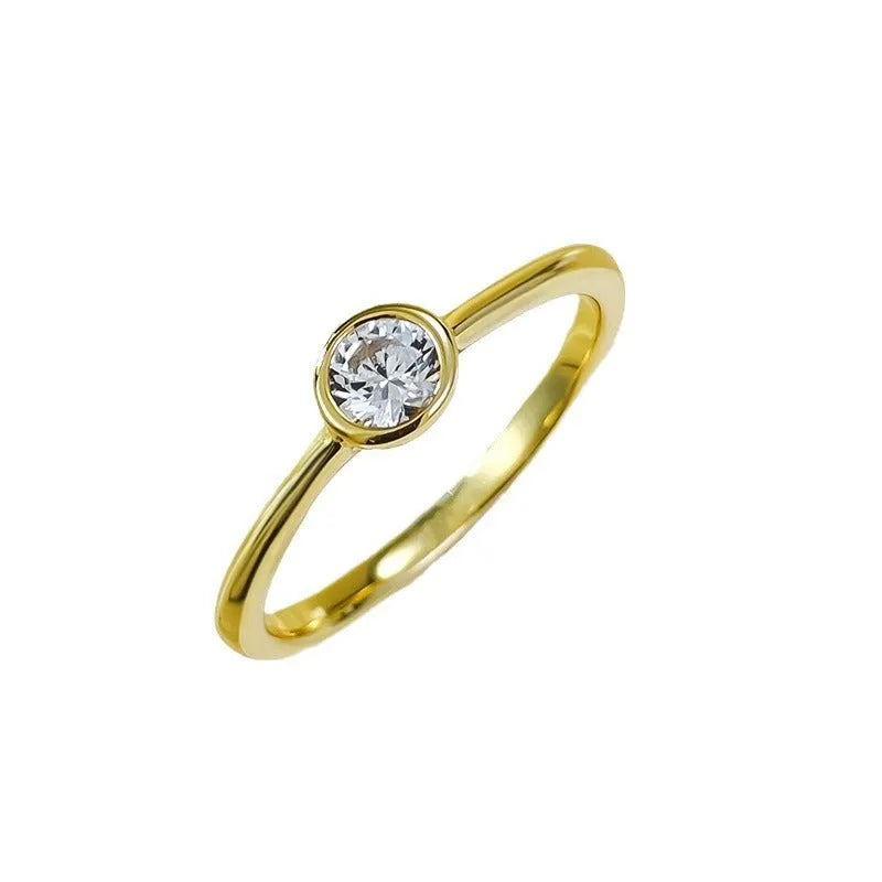 Minimalist crown-shaped silver ring with linear detailing in platinum or gold finish