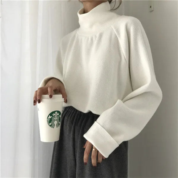 Women's loose fit half-high collar long sleeve top in solid apricot colour