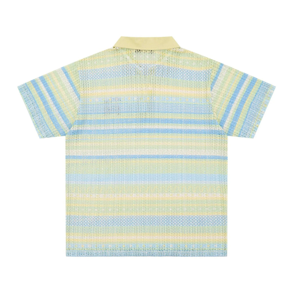 Man wearing a blue printed loose-fit short sleeve casual shirt made from polyester fabric.