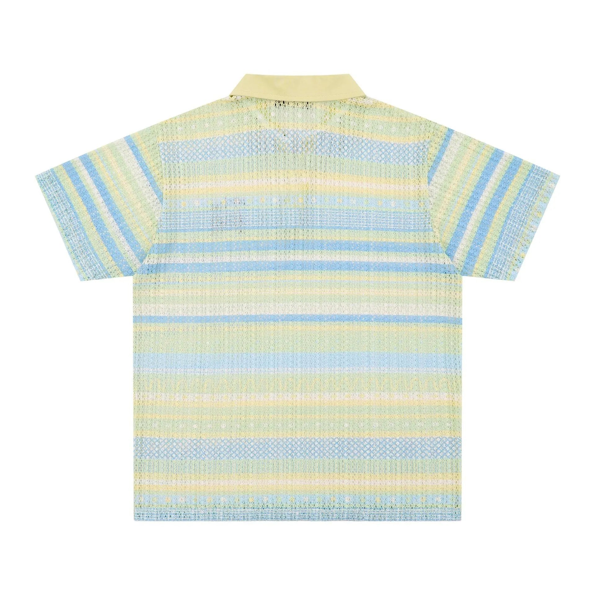 Man wearing a blue printed loose-fit short sleeve casual shirt made from polyester fabric.