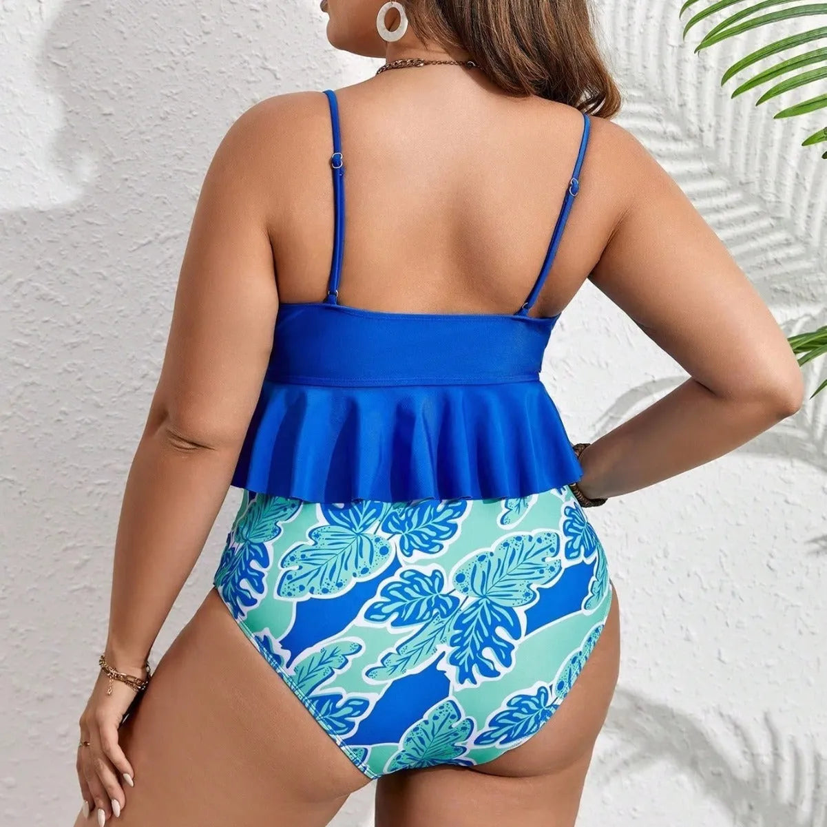 Blue plus size women's bikini set with briefs shorts on mannequin