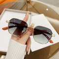 Women's frameless fashion glasses with wood grain pattern on gold alloy frame in double blue colour.
