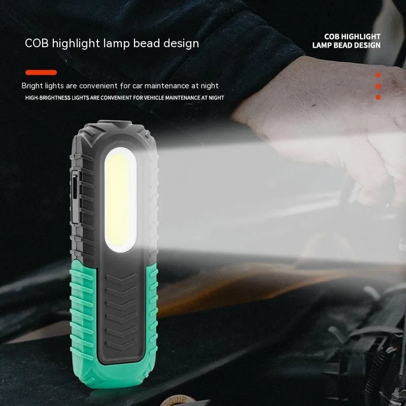 Black and green PET-coated auto repair work light with USB charging port and compact 165mm design