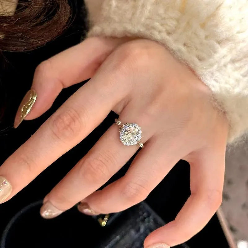 Silver geometric women's ring with elliptical accents and adjustable opening