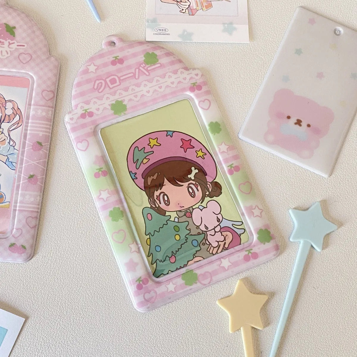 PVC cartoon meal card holder with clear sleeve showing Strawberry and Four-Leaf Clover design options