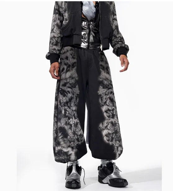 Loose fit printed street style trousers set with hoodie on a neutral background