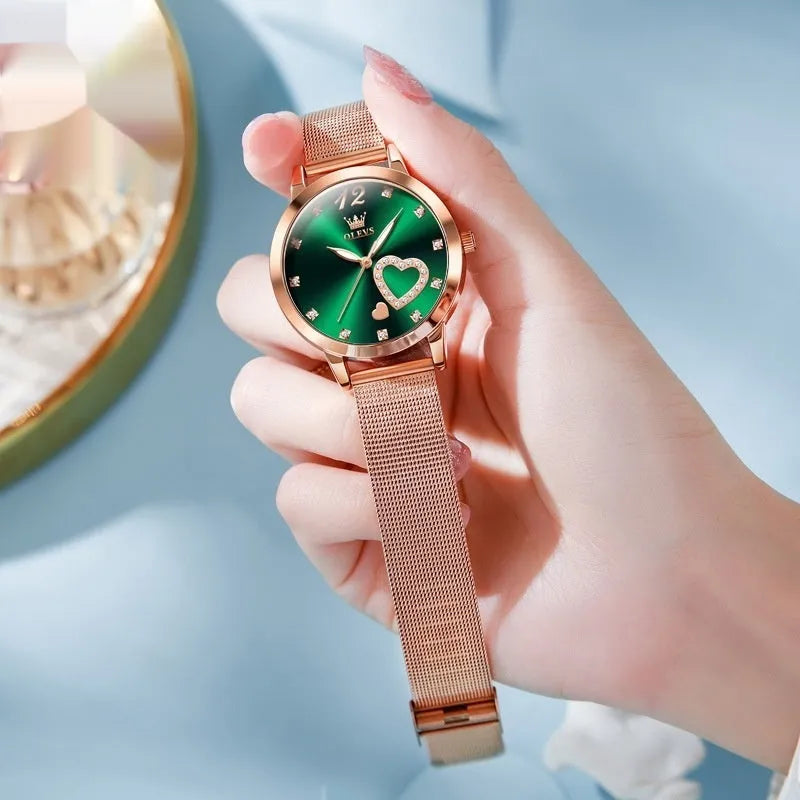 Women's fashion watch with rose shell and mesh strap showing six dial colour options