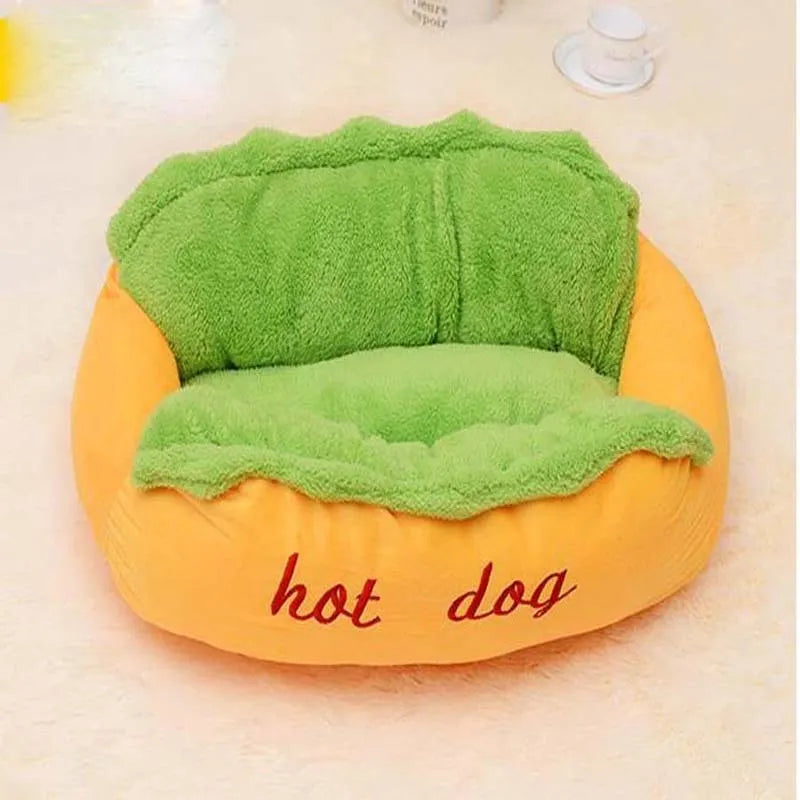 A soft flannelette hot dog bed for pets with a removable mat and anti-slip base, shown in a home setting.