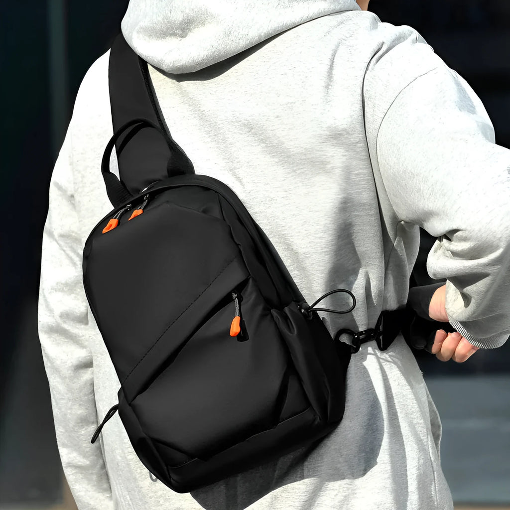 Men's black polyester crossbody bag with simple design and waterproof features