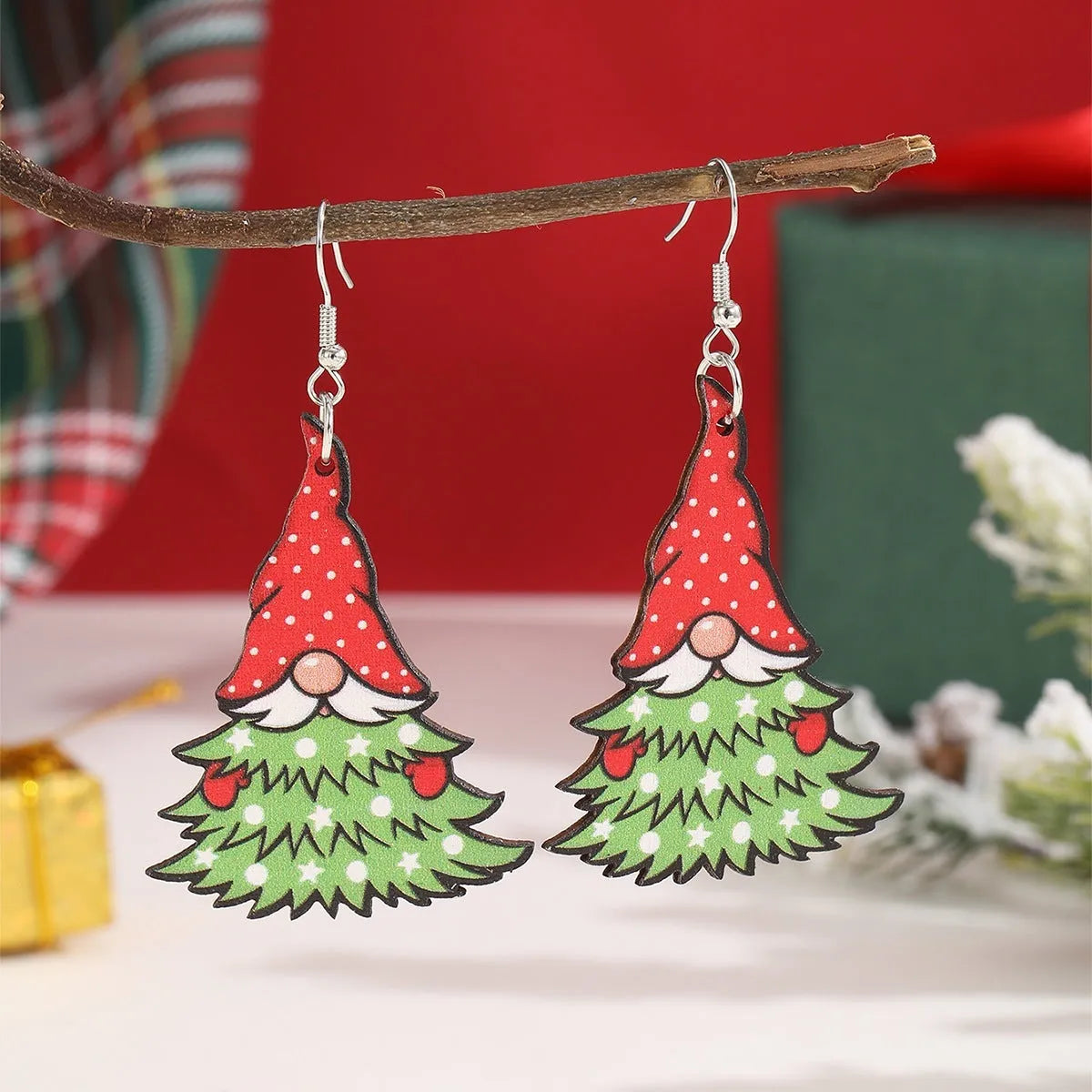 Women's wooden Christmas earrings with printed tree and snowman designs