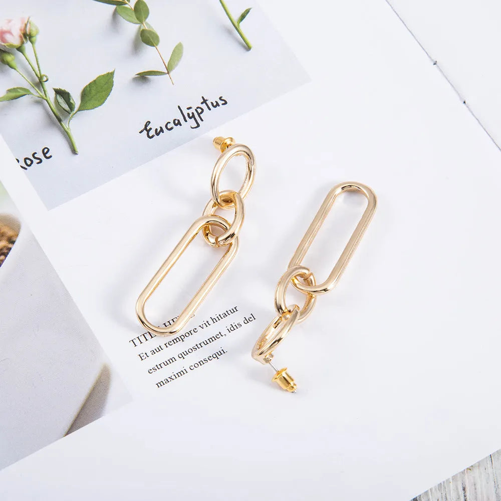 Sterling silver needle geometric hoop earrings with ring and line design on alloy base