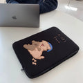 Colourful embroidered laptop sleeve with animal design for a 15.6-inch laptop.