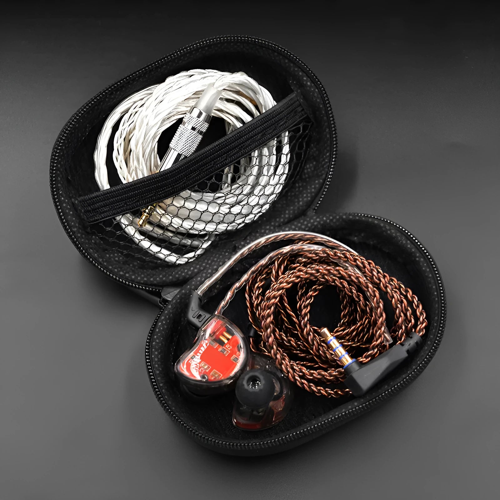 Black leather oval-shaped earphone storage case for EDX PRO and similar models.