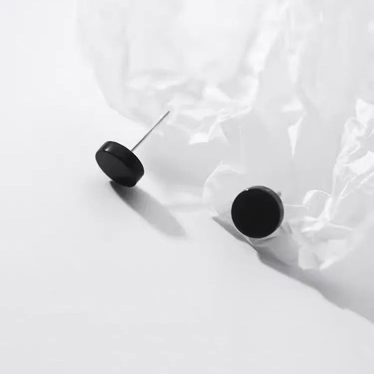 S999 sterling silver flat ear bone studs in black and silver colour options showing different size diameters