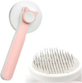 Blue self-cleaning cat and dog grooming brush with rubber handle and metal pins.