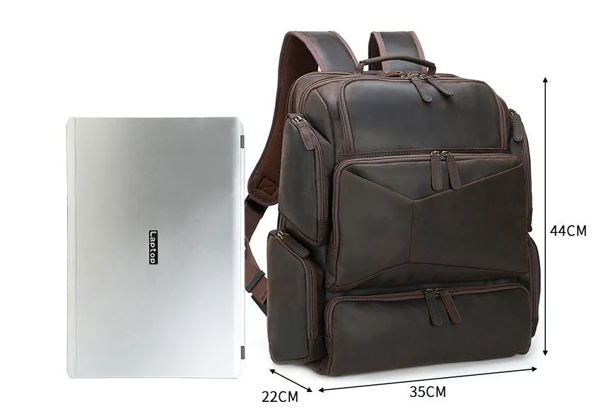 Dark brown leather backpack for 17-inch laptops with multiple compartments and shoulder straps