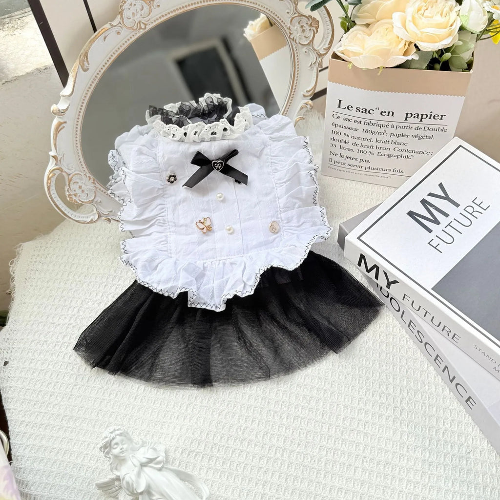 White yarn princess-style gauze skirt for small to medium dogs on mannequin showing chest and length measurements