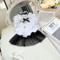 White yarn princess-style gauze skirt for small to medium dogs on mannequin showing chest and length measurements