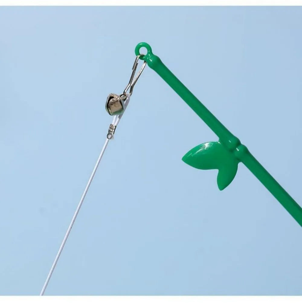 Green interactive cat wand toy with feathers and a bell on a durable plastic handle.
