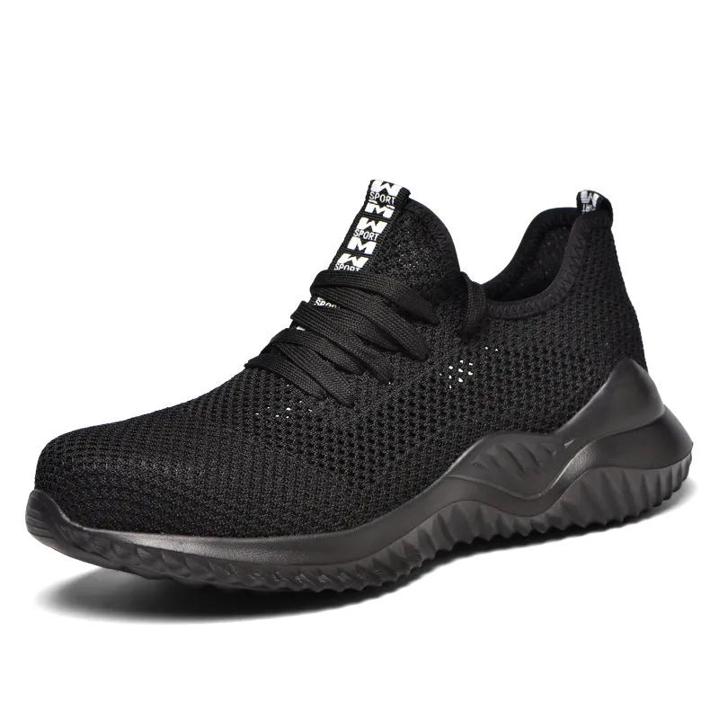 Low-cut black safety work shoes with a steel toe cap and EVA midsole on a grey background.