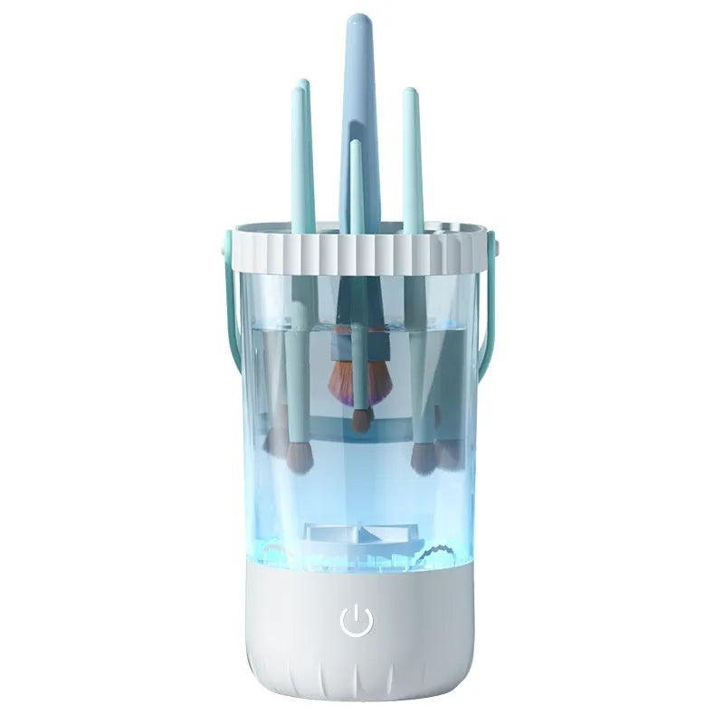 White rechargeable electric makeup brush cleaning tool with USB cable.