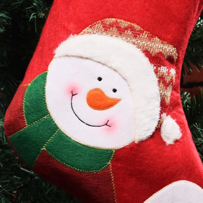 Non-woven fabric Christmas candy bag showing elk, elderly man, and snowman printed designs for tree hanging
