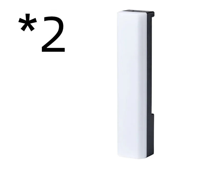 3D RGB voice-activated table top ambiance lamp in white or black shell with USB cable.