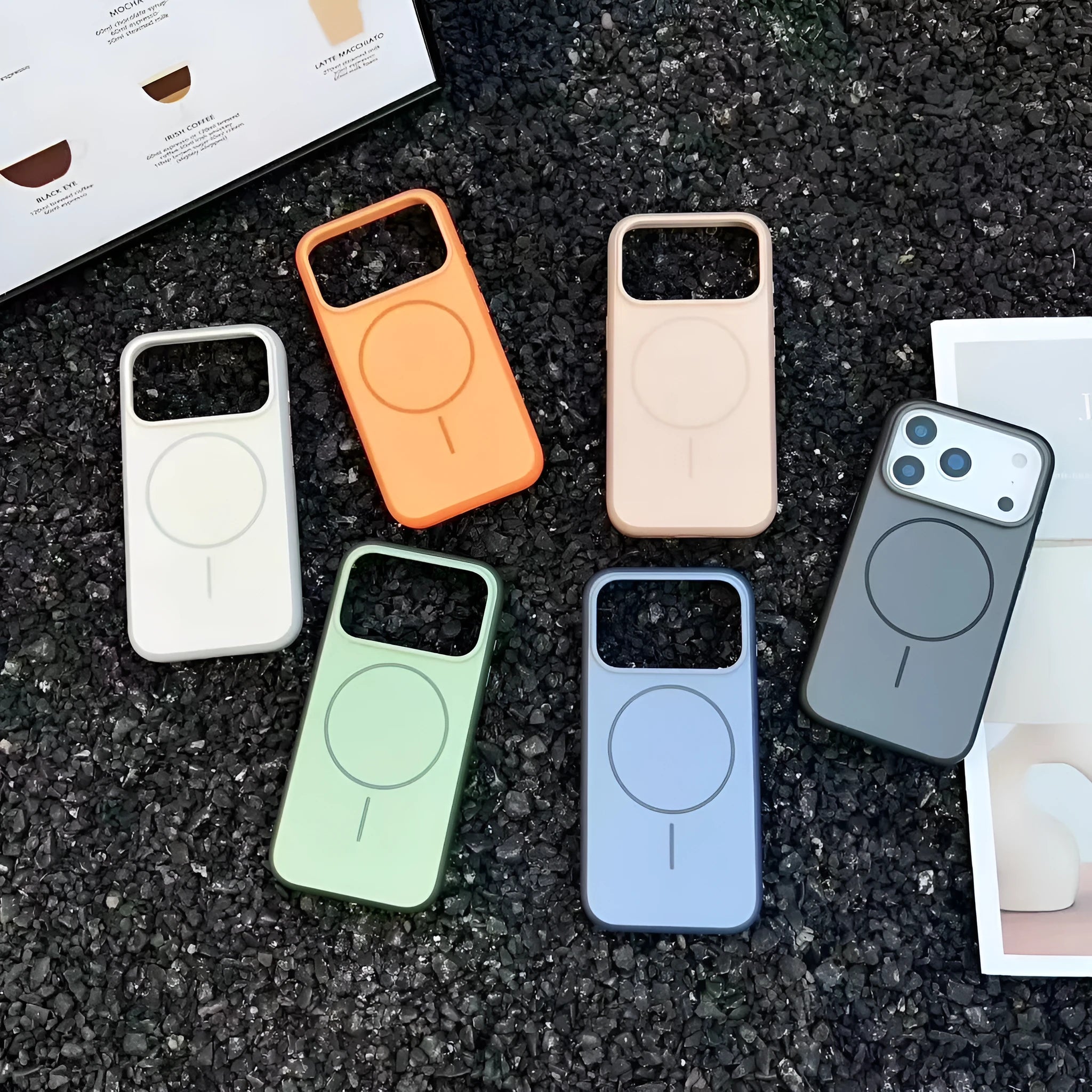 Blue frosted magnetic iPhone case showing AI camera button and precise cutouts for ports and camera.