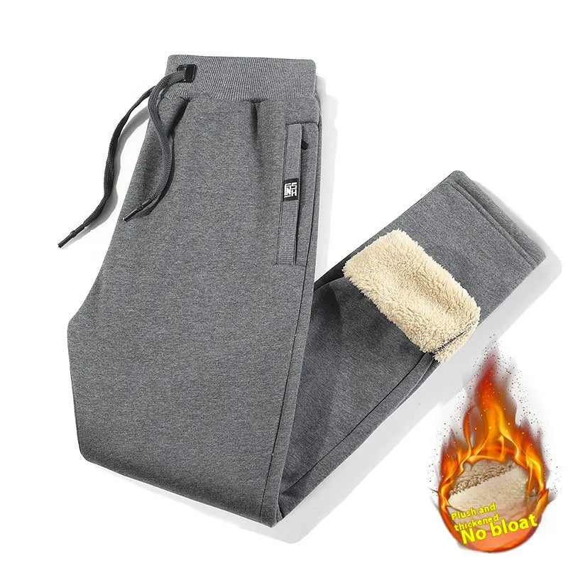 Men's grey fleece-lined cotton track pants with elastic waist in plus-size fit