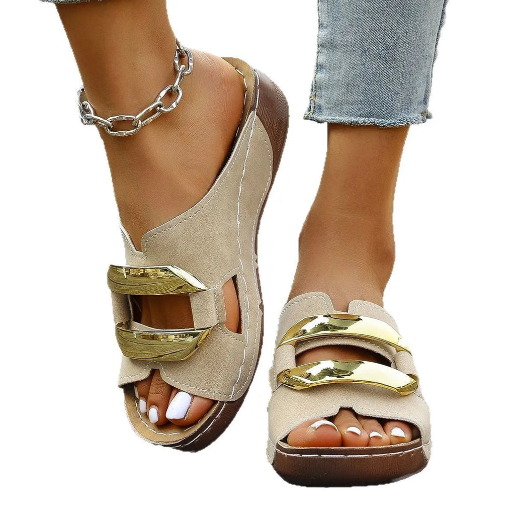Roman style platform flip-flops in solid colour with metal decorative elements and rubber sole
