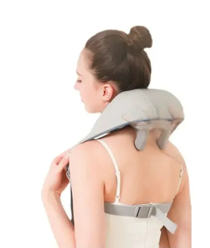 Milky white rechargeable handheld shoulder and neck kneading massager with USB cable.