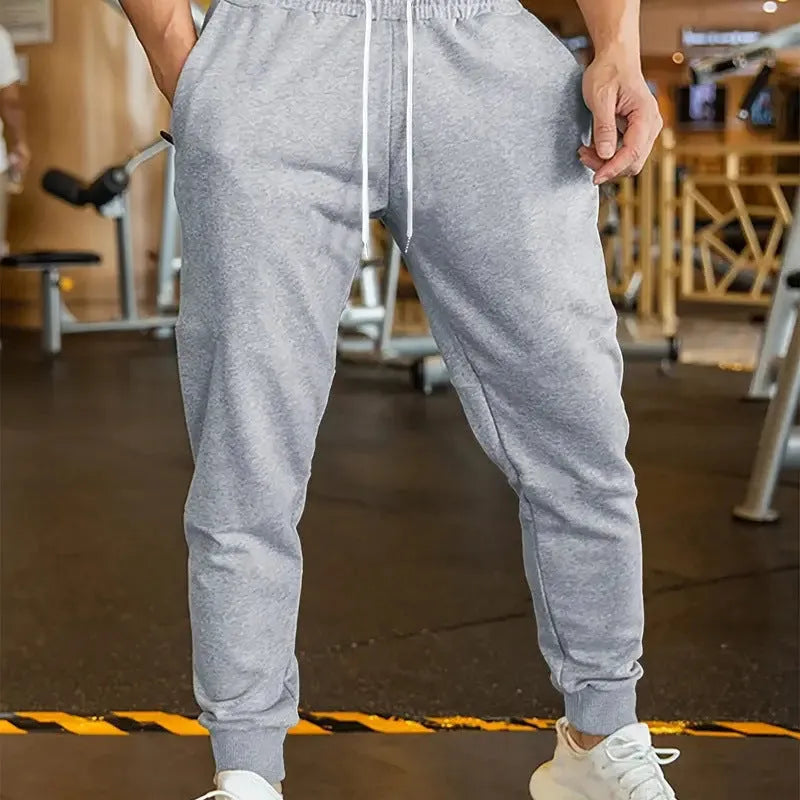 Men's loose-fit linen trousers with 3D pattern design and elastic lace waist with drawstring closure