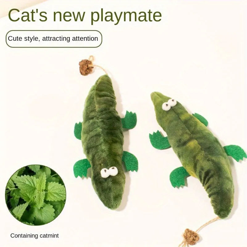 Green plush alligator catnip toy with plant-based materials and peppermint scent for feline oral cleansing