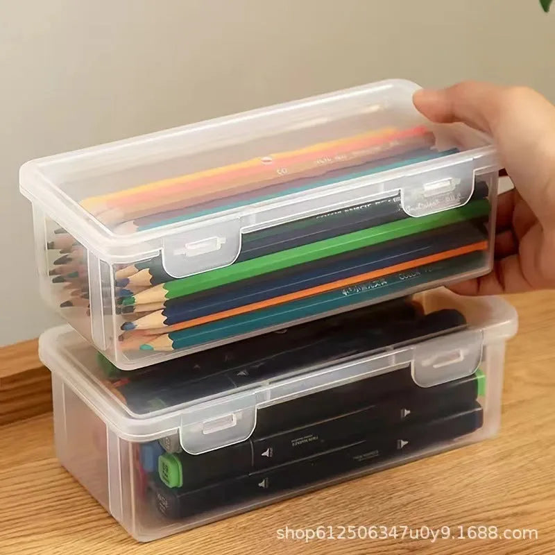 Transparent plastic pencil storage box with large capacity for crayons and colouring pencils.