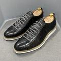 Men's handmade black leather shoes with embossed pattern, low tube height, and front lace-up fastening.