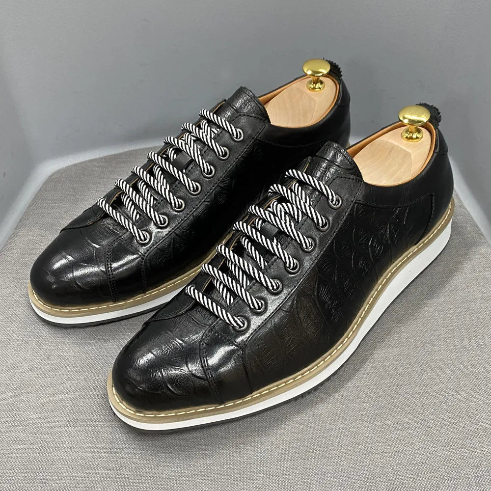 Men's handmade black leather shoes with embossed pattern, low tube height, and front lace-up fastening.