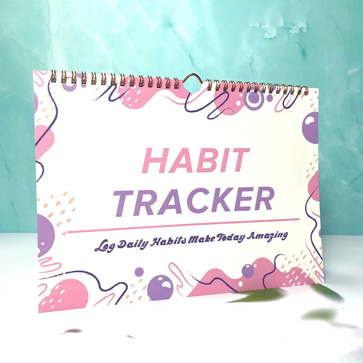 English habit tracking journal with 12 pages in 21cm by 28cm size