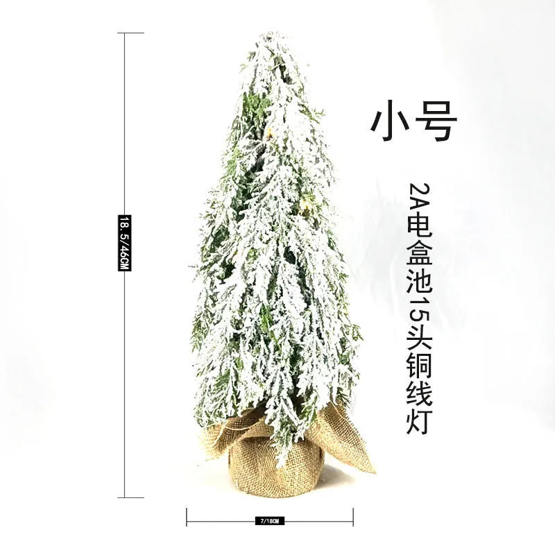 24 inch green artificial Christmas tree with LED lights and snow sprayer decoration on desktop