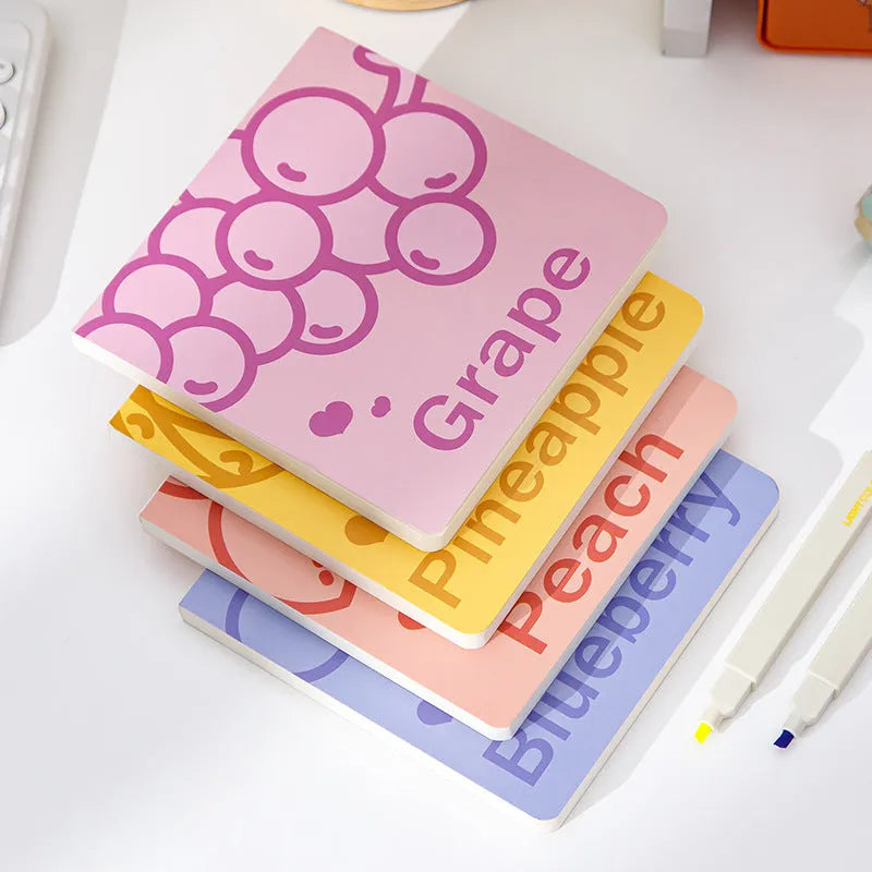 Square notebook with embossed fruit design cover, showing 14.5 cm size and thickened paper pages.