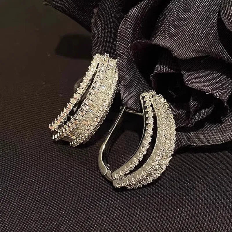 Geometric copper stud earrings with white gold plating and inlaid zircon stones