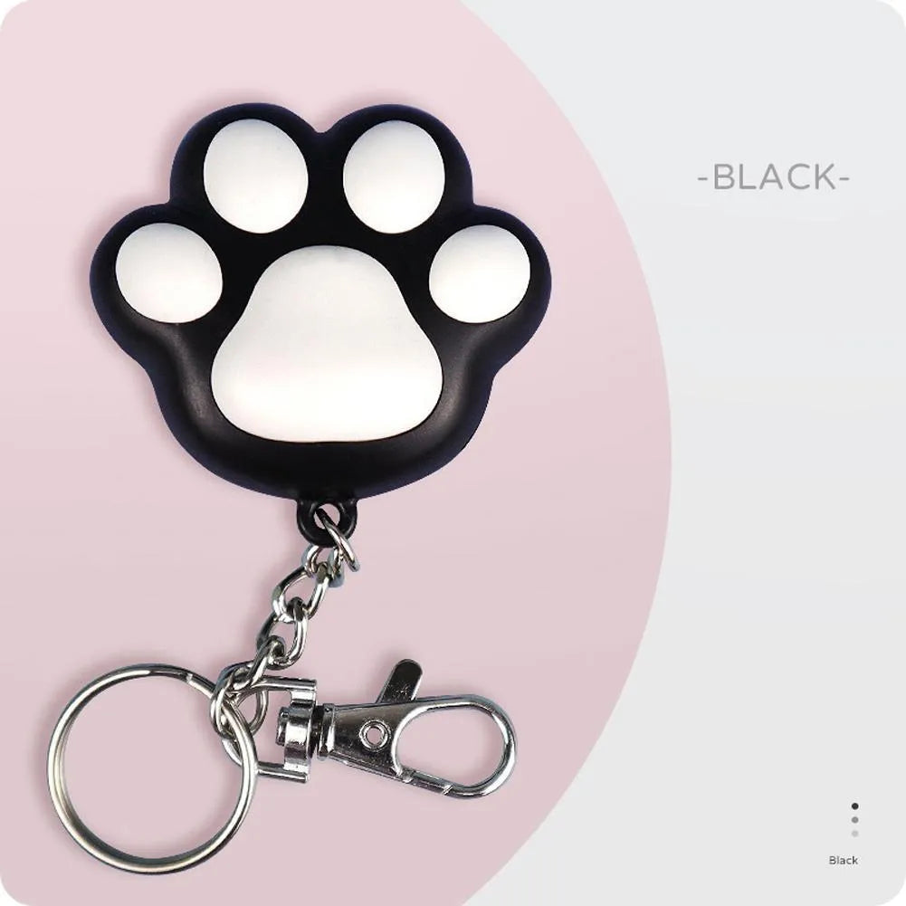 Pink or black USB rechargeable infrared cat teaser keychain with compact plastic housing