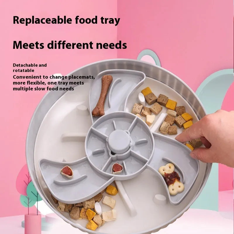 Plastic pet slow feeder bowl with a blue silicone windmill-pattern licking mat inside.