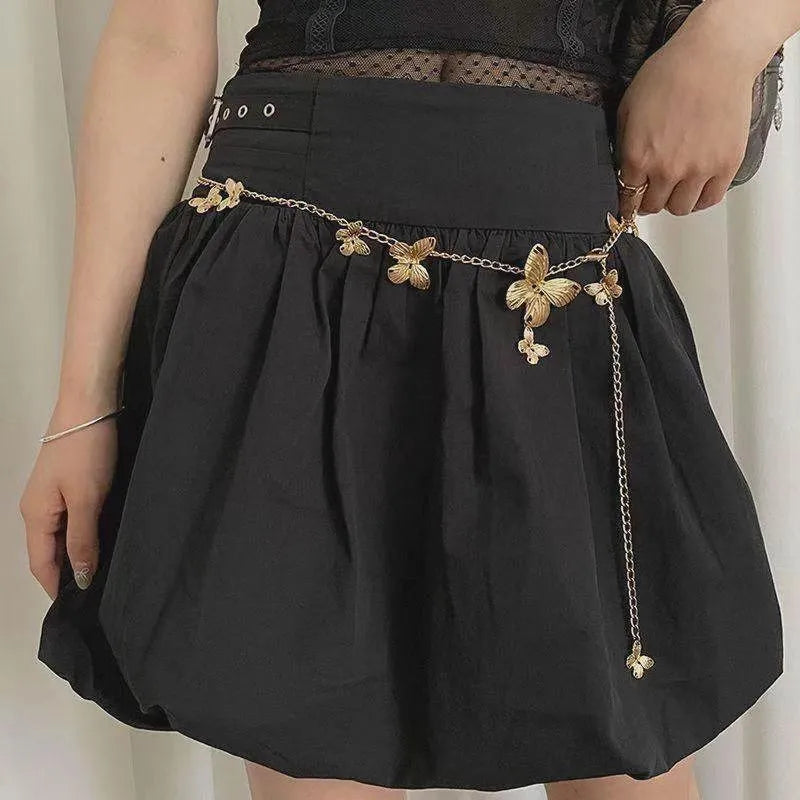 Gold or silver alloy waist chain belt with butterfly design measuring 104cm long and 40mm wide