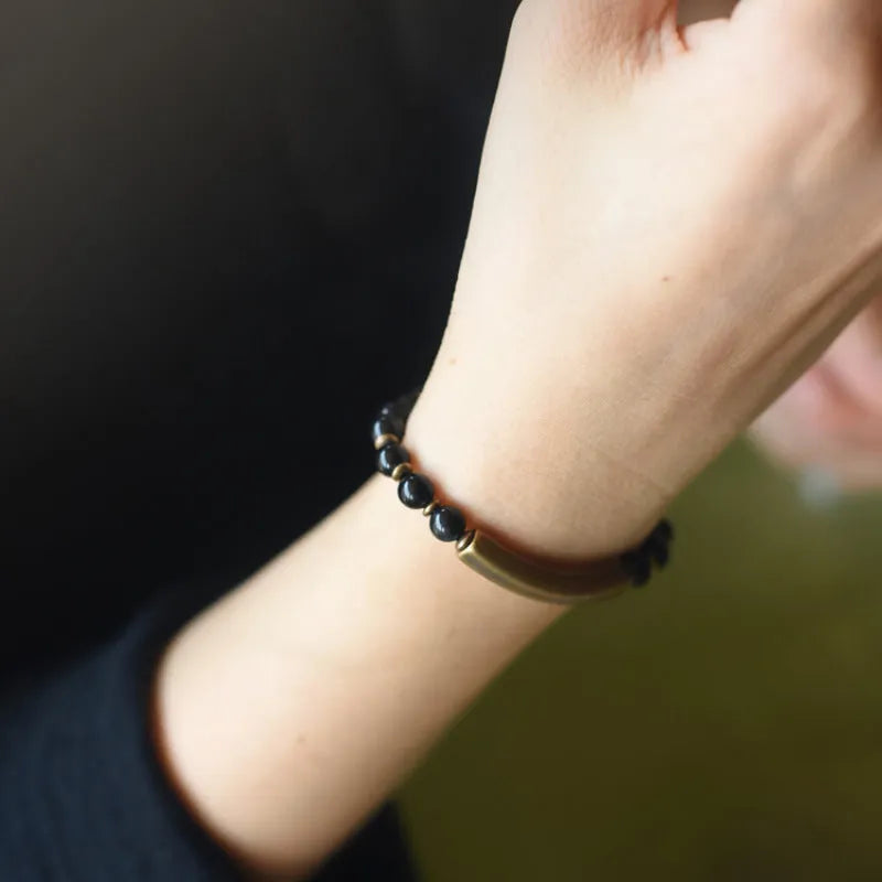 Layered retro ethnic beaded bracelet made from natural stone and brass for men and women.