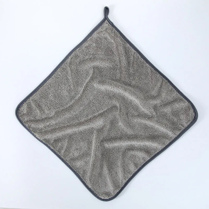 Grey braided twisted microfibre car cleaning cloth towel shown in multiple size options on a car bonnet.